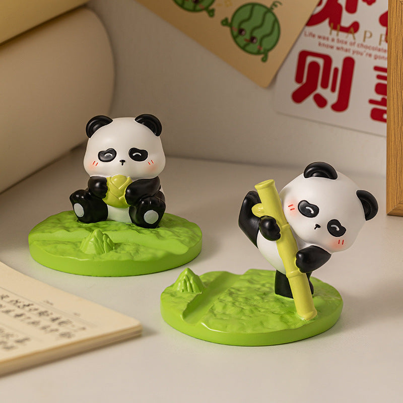 Nom Nom Bamboo Pals Panda Phone Holder with green bamboo base – Functional & decorative.