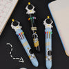 Cute space-themed multi ink pens with astronaut design