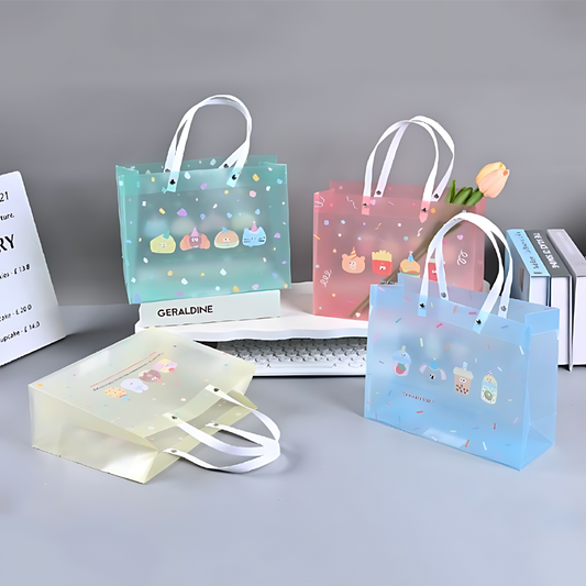 Kawaii transparent gift bags with cartoon prints and white handles