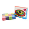 Packaging box for "Colored Dominoes" showing a rainbow circle arrangement of blocks.