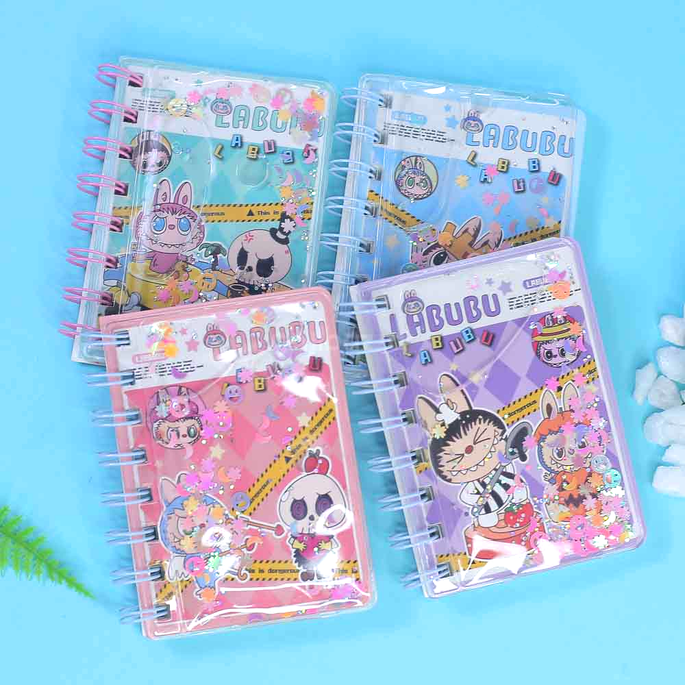 Kawaii monster water and glitter diary with spiral binding and floating confetti cover.