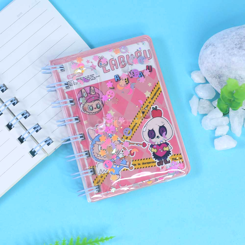 Cute monster-themed spiral notebook for kids with water-filled glitter design.