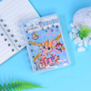 Adorable kawaii diary with colorful monster art and transparent shaker cover.