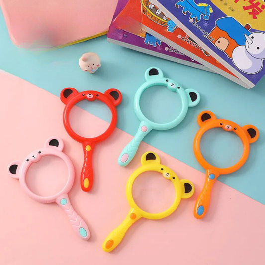 Cartoon bear-shaped kids magnifying glass in assorted bright colors.