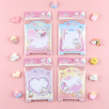 Four packs of "Milu's Memo Mania" sticky notes hanging on a display rack featuring cute cat illustrations.