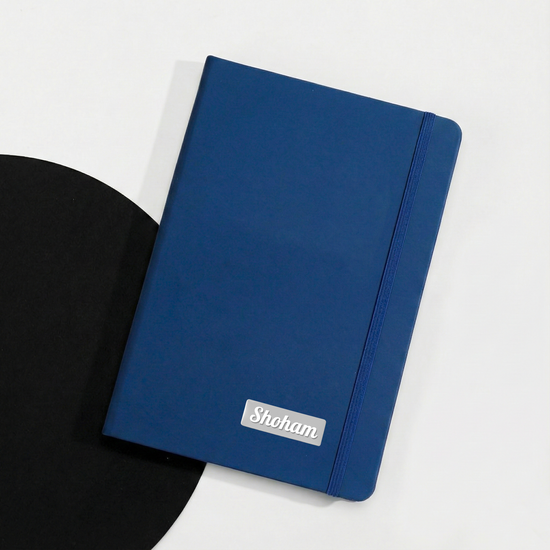 Closed blue personal diary showing smooth cover texture suitable for custom logo printing.