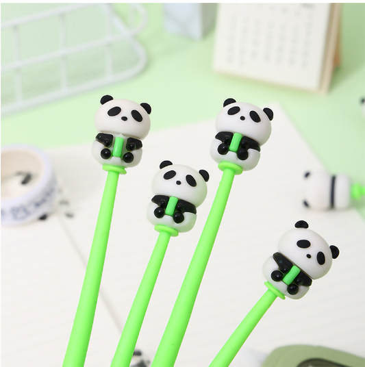 A collection of green barrel panda shake gel pens displayed next to an open notebook on a light green background