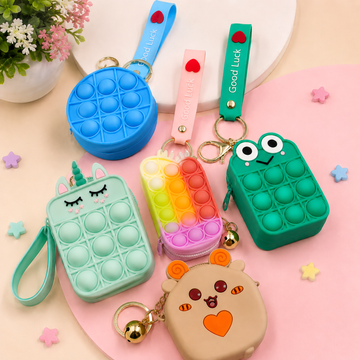  assorted colorful  silicon coin purse keychains in clear protective bags showing various shapes and character designs.
