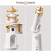 Close-up product shot of the Moon Lighthouse showing its detailed gold roof, balcony, motion sensor, and interior staircase arch.