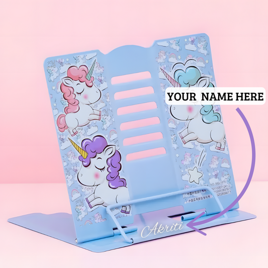 Blue reading stand featuring a cartoon unicorn print with pink mane and decorative stars.