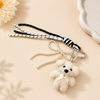 Fluffy Teddy Bear Keychain – Cute Plush Bag Charm with Pearl Bow & Woven Lanyard