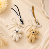 Fluffy Teddy Bear Keychain – Cute Plush Bag Charm with Pearl Bow & Woven Lanyard