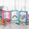 Rainbow Rush PVC gift bags with colorful rainbow and heart prints