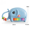 Dimension guide for the 16cm long by 9cm tall elephant musical piano toy.