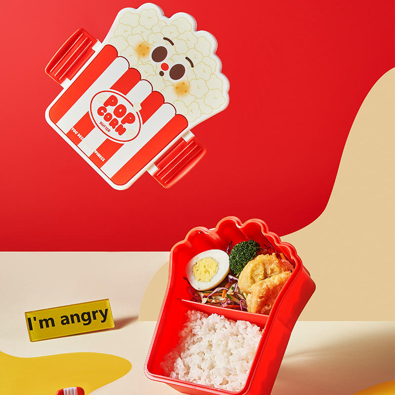 Cute red popcorn lunch container for kids with secure lock and cutlery.