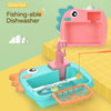 A complete set of the kids' dishwasher toy showing the basin, drying rack, ladle, knife, fork, and assorted colorful play food items.