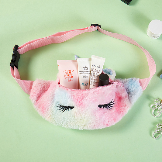 Front view of purple tie-dye unicorn chest bag with zipper and embroidered eyelashes.