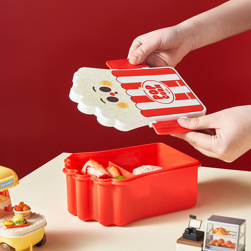 3D popcorn-style bento lunch box for children with compartments.