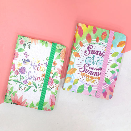 Decorative pocket-size notebooks with vibrant floral covers