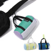 A blue mini mesh duffle bag coin pouch hanging securely from a black backpack strap using its metal carabiner clip.