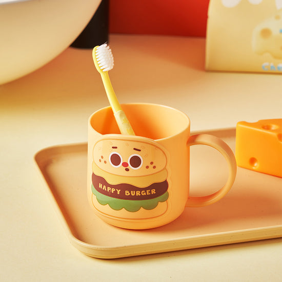 Snack Squad cartoon cup for brushing, drinking, and rinsing