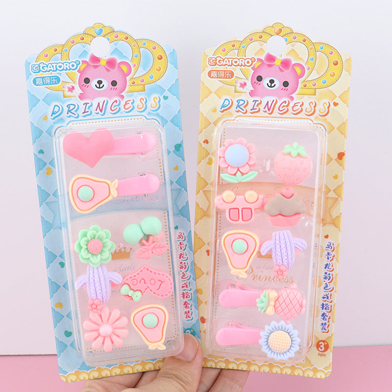 Cute children’s accessory set featuring colorful resin clips and rings.