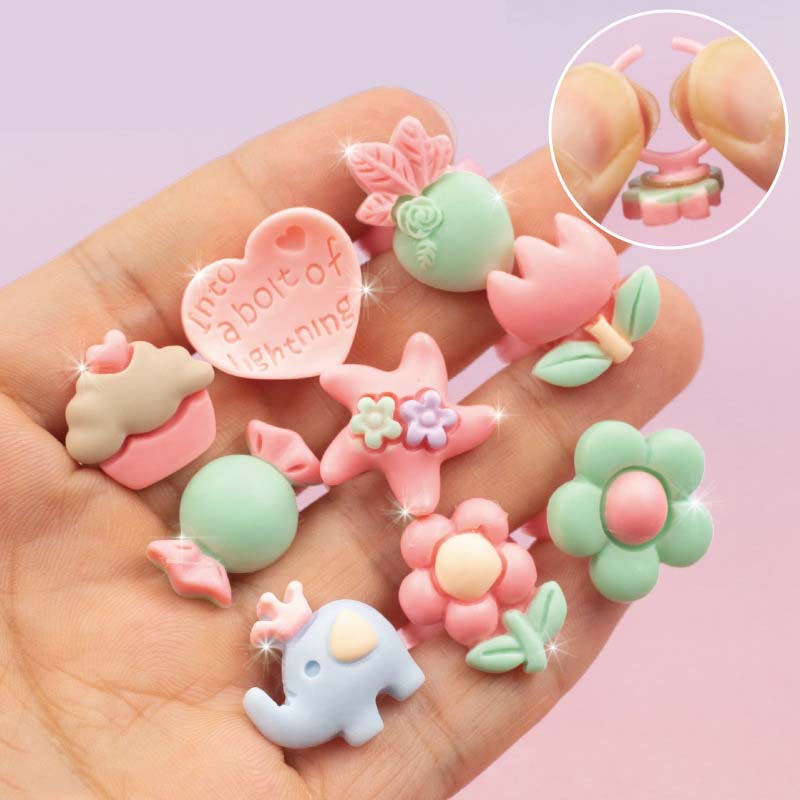 Kawaii children’s jewelry ring set with colorful resin designs.