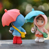 Cute Boy and Girl with Umbrella Miniature Figurines - Set of 2