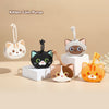 Five assorted colorful Q UNCLE cartoon cat silicone mini storage bags on display stands.