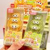 Cookie Family eraser set featuring colorful biscuit and star-shaped erasers with cute cartoon eyes in brown, yellow, and green.