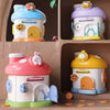 Set of colorful mushroom-shaped toy houses with cute animal figures on top, designed for kids’ play and decor.