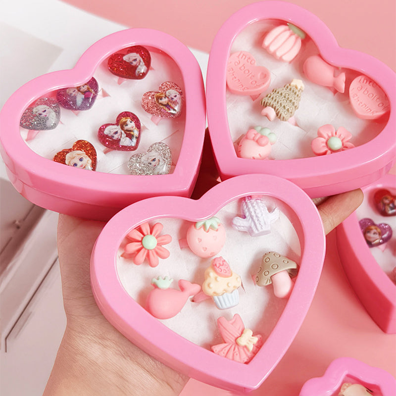 Colorful children’s adjustable resin rings in cute heart-shaped trays.
