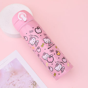 A pink stainless steel water bottle with cute kitty prints, hearts, and bows, placed on a blue table against a pink background.