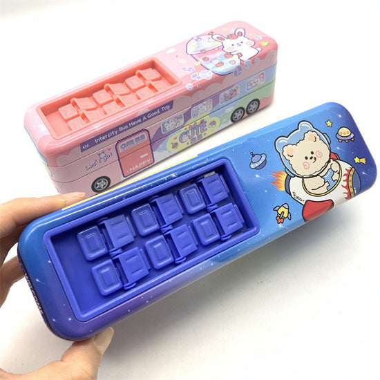 Bus-shaped pencil box for children in blue and pink with cute cartoon graphics and multiple compartments.