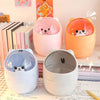 Multiple colorful bear trash cans used as desk organizers.