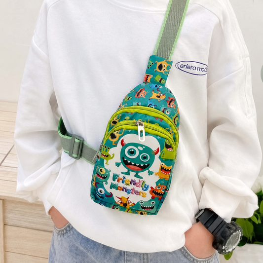 Child wearing a colorful crossbody bag with cartoon designs on a light background