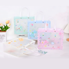 Large kawaii transparent gift bags with pastel prints and handles