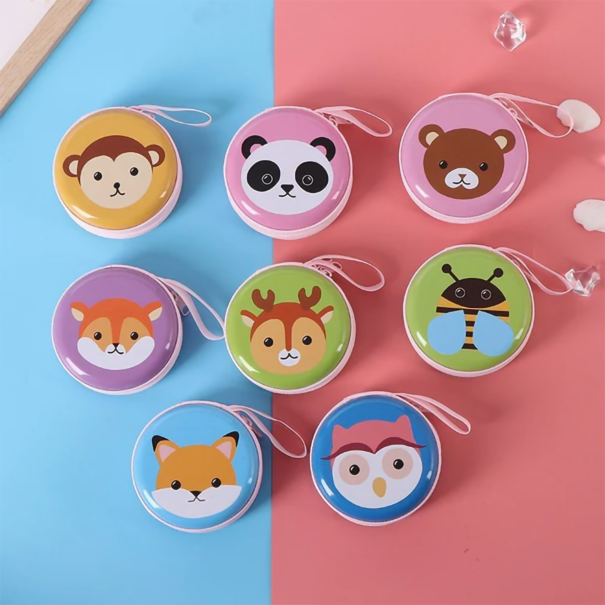 Premium reusable panda, fox, and bee theme mini zipper bags with attached fabric carrying straps on a table.